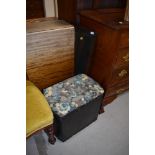 A vintage oak framed wall mirror and a woven fibre linen basket