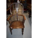 A traditional oak windsor armchair