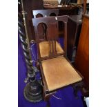 Two early 20th dining chairs having upholstered seats