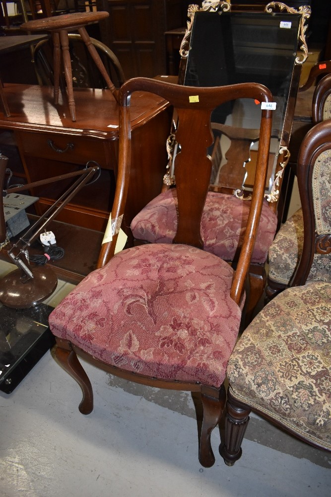 A pair of early 20th Century Queen Anne style vase back upholstered dining chairs