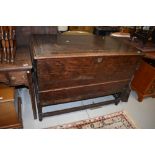 A period oak bedding chest on legs, with later restorations, width approx 120cm