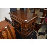 A lovely quality reproduction (Reprodux) nest of three traditional oak tables, in excellent