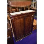 A stained frame panel cupboard, with tiled top