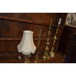 A selection of various design brass table and side lamps