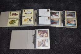 A collection of GB PHQ Cards and First Day Covers, 1980's-90s in four albums