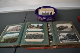 A collection of early Postcards in two albums and loose, mixed interest