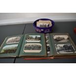 A collection of early Postcards in two albums and loose, mixed interest