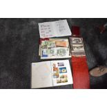 A collection of World Stamps, Covers, Postcards and GB Banknotes