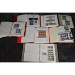 Seven Albums of Mint GB Elizabeth II Stamps, Booklets, Part Sheets, Airmail, Blocks, all well