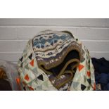 A large bag full of ladies chunky knit wear in larger sizes, some good brands and quality items