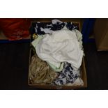 A box full of ladies shirts and tops in different styles, some good brands and quality items amongst