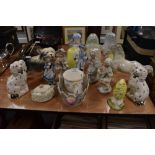 A mixed lot of ceramics including Staffordshire style figurines and dogs, a Coalport toadstool and