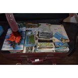 A suitcase full of vintage postcards,upwards of 1000 approximately, a a real mixture of eras and