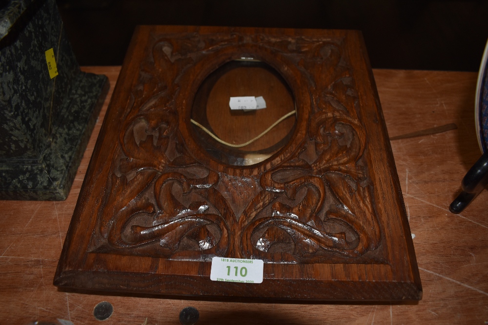 Two rustic antique wall hanging photo frames.