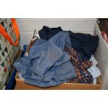 A box full of ladies shirts and tops in different styles, great condition and perfect for resale,