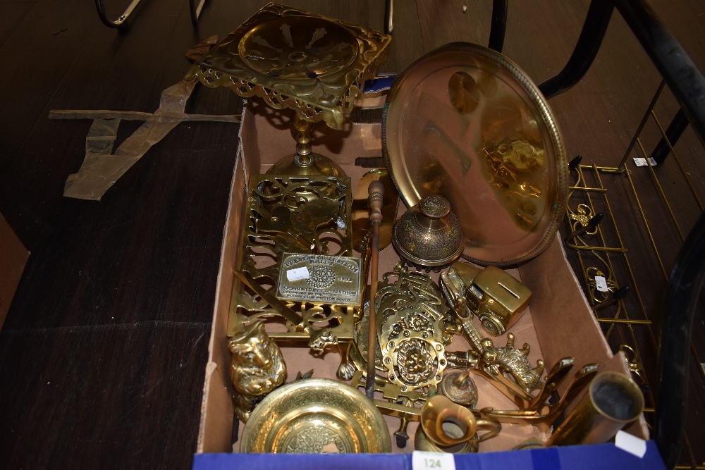 A box full of interesting brass collectables including a money box in the shape of a bear,