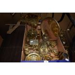 A box full of interesting brass collectables including a money box in the shape of a bear,