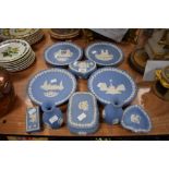A large quantity of Wedgewood, including christmas plates, trinket dishes and vases, around fourteen