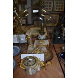 A continental onyx or similar clock having ormolu mounts, cherub detail and lion head handles to