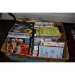 A large box of Elvis VHS videos, some rare and interesting titles