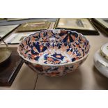A Japanese export fruit bowl having hand painted design in the Imari palette.