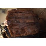 A 1940s fur cape having utility label,fully lined.