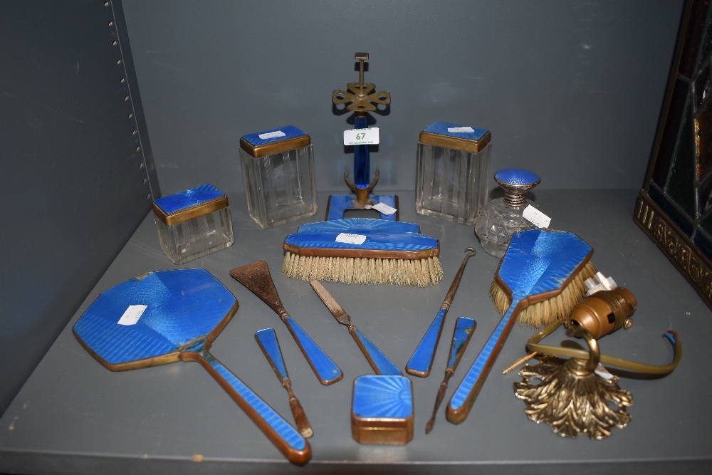 A vintage fifteen piece enamelled dressing table set, in a beautiful blue