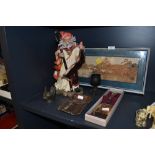 A selection of curios including Enchanted style Merlin figure and Chinese cork diorama