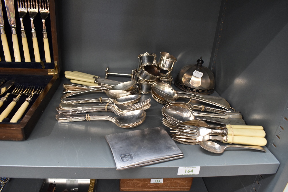 A selection of silver plate including napkin rings, cutlery etc