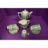 A part Mintons Solano ware coffee set designed by John Wadsworth comprising of five cups , six