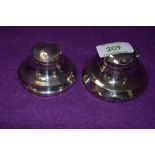 Two HM silver capstan inkwells of traditional form, both lids are loose