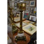 An impressive large brass table top lamp having ornate detail to base.