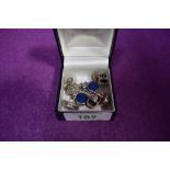 Four pairs of white metal stud earrings stamped 925 of various forms including Lapis Lazuli,