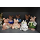 A selection of ceramic money box or piggy bank by Wade for Nat West