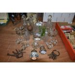 A collection of vintage and antique glass including bottle stoppers, perfume bottles and trinket