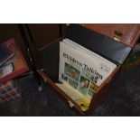 A retro vinyl storage carry case housing a collection of childrens LP records,45's and shellac