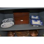 A graduated mahogany Edwardian letter rack and selection of ceramic serving dishes