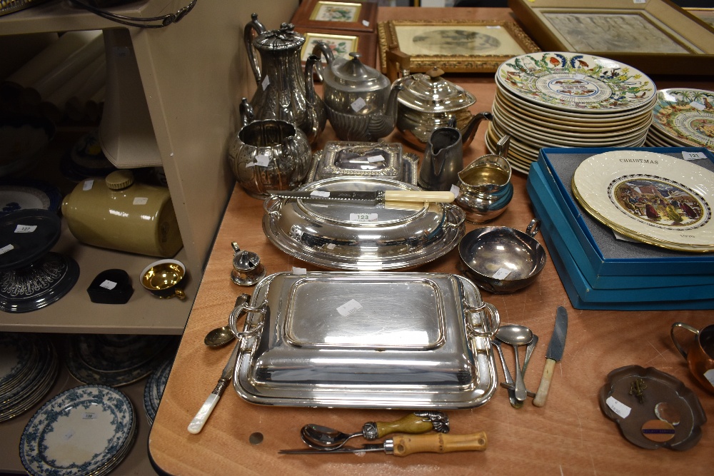 A large collection of fine plated wares, including tureens, tea pots,an assortment of cutlery and