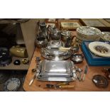 A large collection of fine plated wares, including tureens, tea pots,an assortment of cutlery and