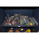 A selection of toy trains and similar model layout accessories