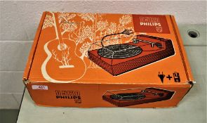 A boxed vinatge Phillips portable record player.