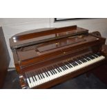 A traditional mahogany cased baby grand piano , labelled Dagmar