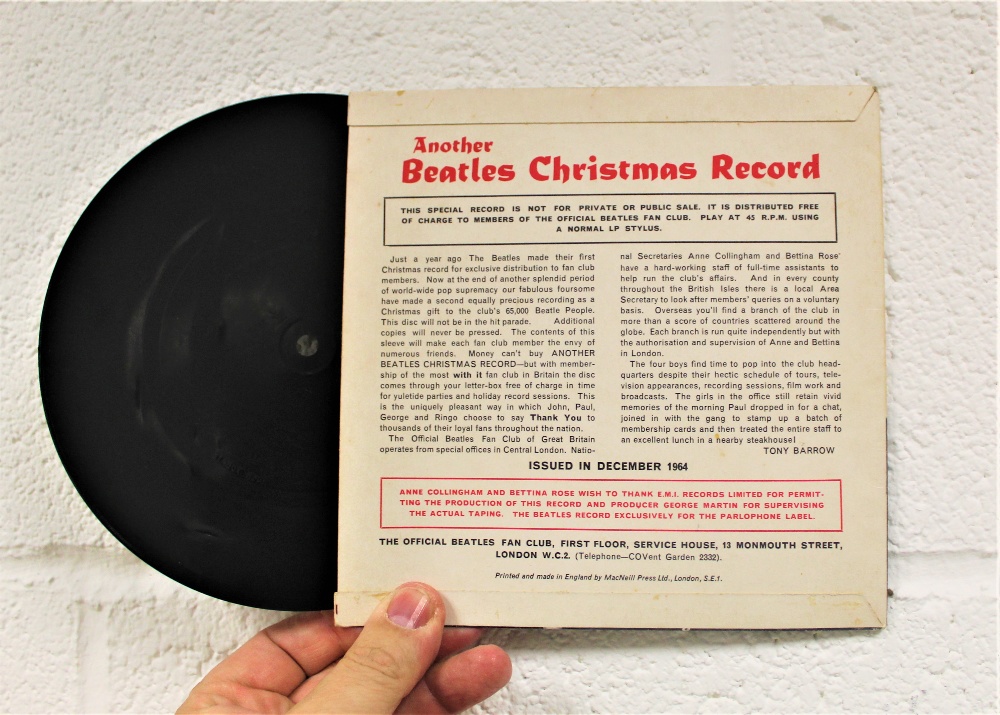 A Beatles Christmas fan club record with inserts, some label damage. - Image 2 of 2