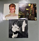 Three later press David Bowie albums.