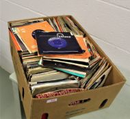A large box of various 7' singles.