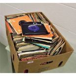 A large box of various 7' singles.