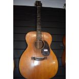 A Martin 000-18 acoustic guitar, serial number 149021, dater project lists as 1956 with Martin