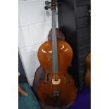 A traditional cello, labelled Rosetti (tatra) Stradivarius model