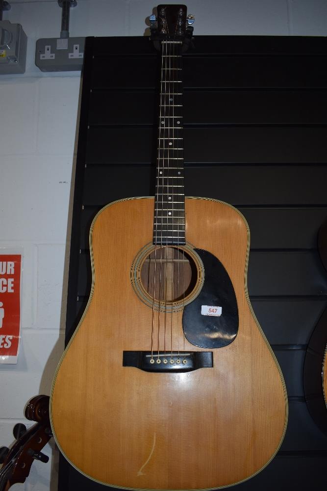 A Martin D-28 acoustic guitar, serial number 246438, dater project lists as 1969 , with blue