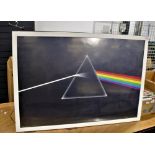 A large reproduction Pink Floyd 'Dark side of the moon' poster in frame.